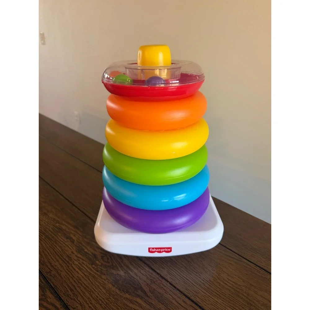 Fisher-Price Rock-a-Stack Rainbow Ring Stacker Baby Toy with Rattle Beads